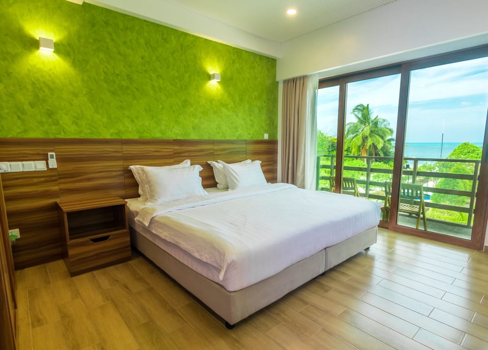 Deluxe Double or Twin Room, 1 King Bed, Sea View | In-room safe, desk, blackout drapes, soundproofing