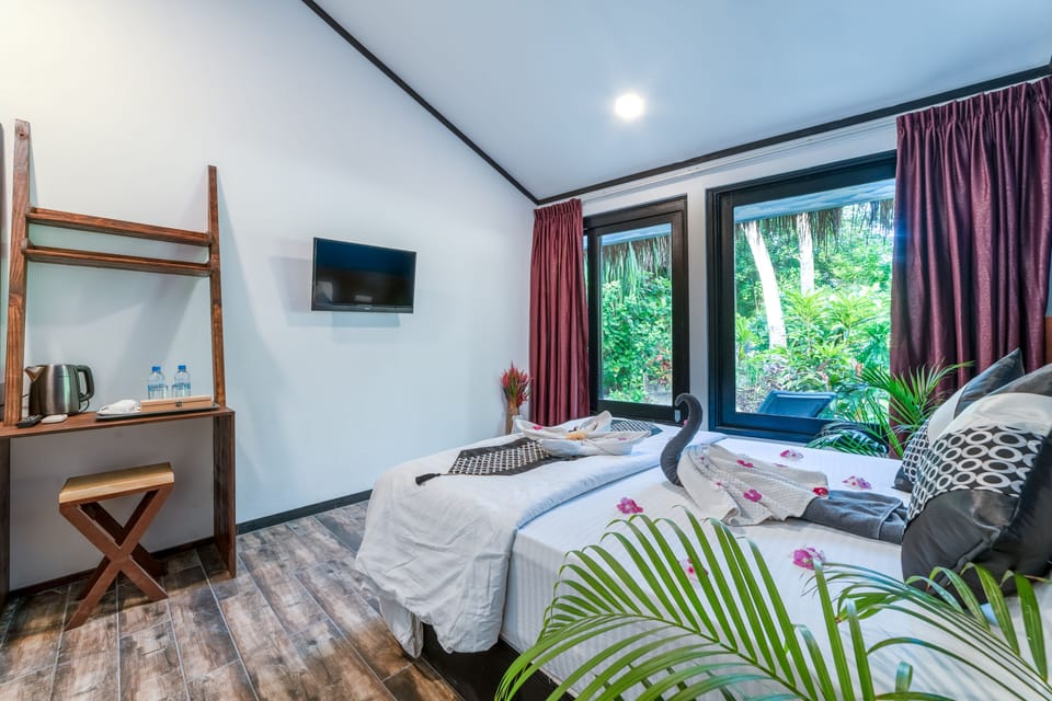 Deluxe Double Room, Non Smoking, Garden Area | Down comforters, minibar, in-room safe, individually decorated