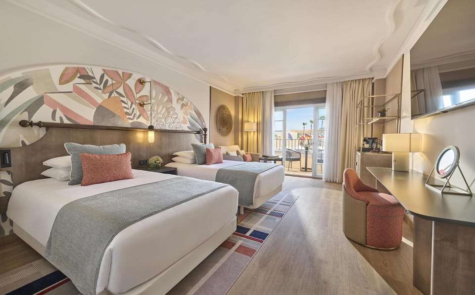 Premium bedding, down comforters, memory foam beds, minibar
