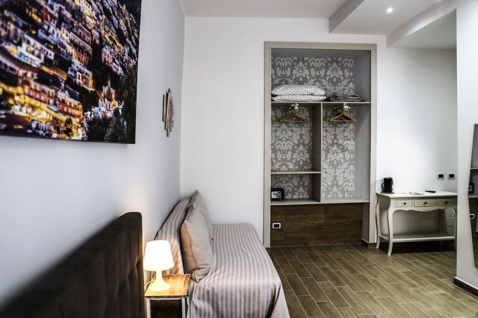 Quadruple Room, Balcony, City View | Room amenity