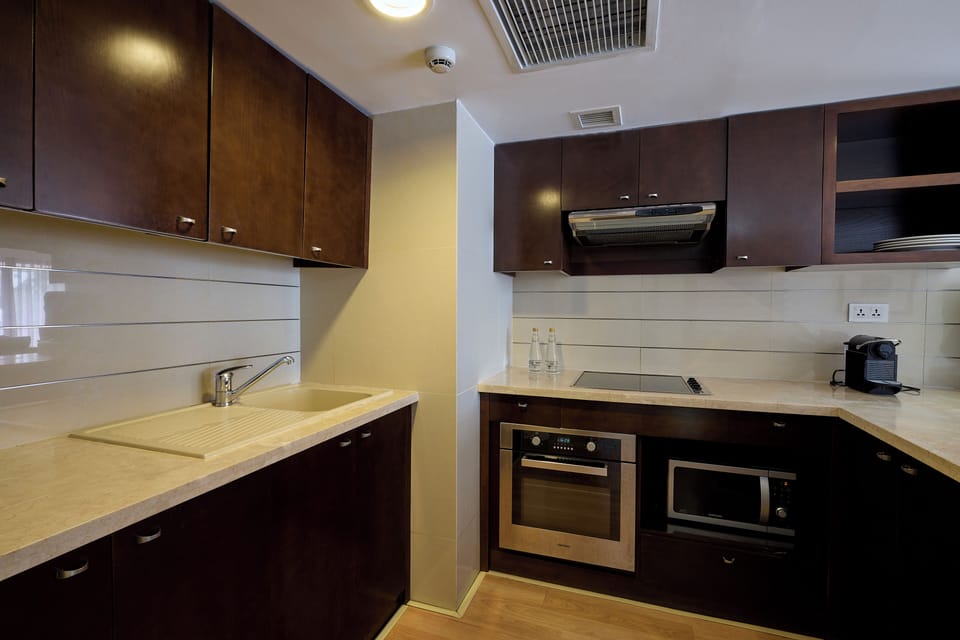 Club Suite, 1 Bedroom, City View | Private kitchen | Fridge, coffee/tea maker, electric kettle