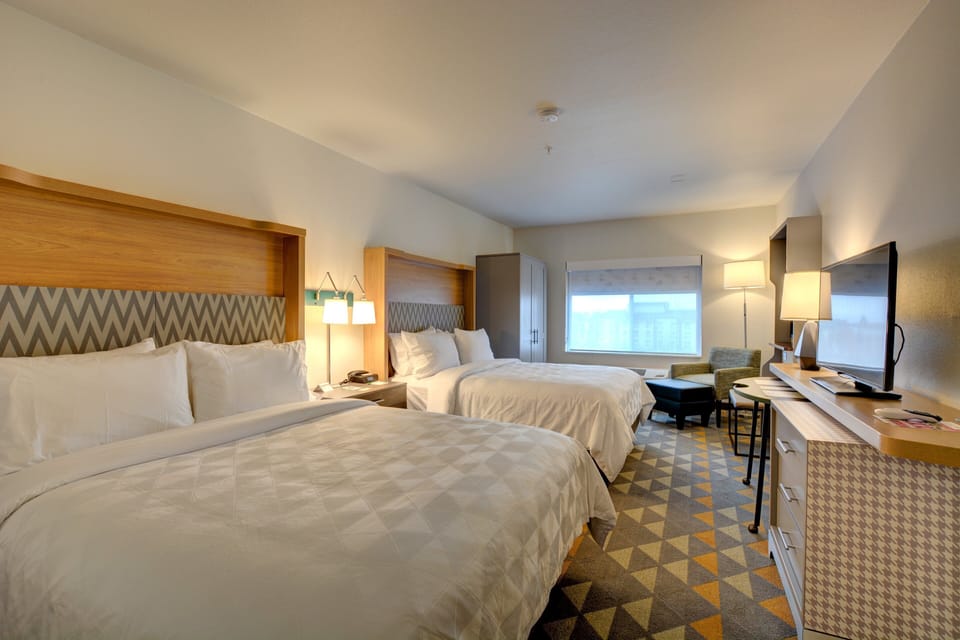 Down comforters, pillowtop beds, desk, blackout drapes