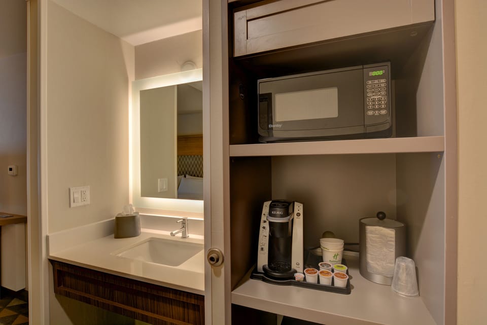 Down comforters, pillowtop beds, desk, blackout drapes