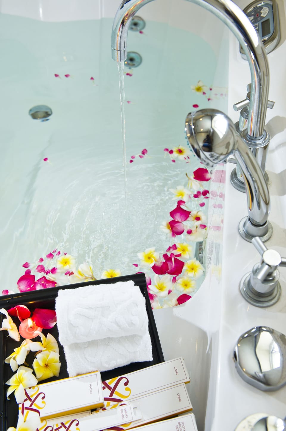 Combined shower/tub, designer toiletries, hair dryer, bathrobes
