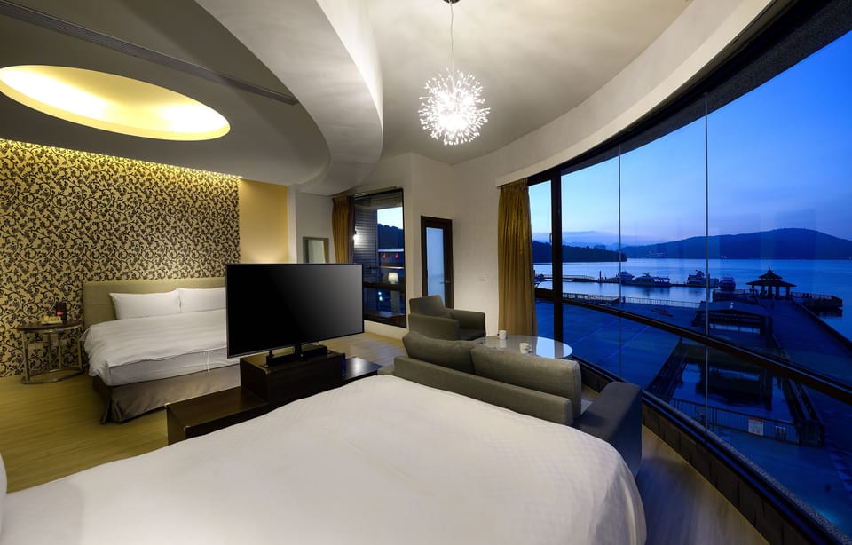 Luxury Quadruple Room, Lake View | Down comforters, desk, blackout drapes, soundproofing