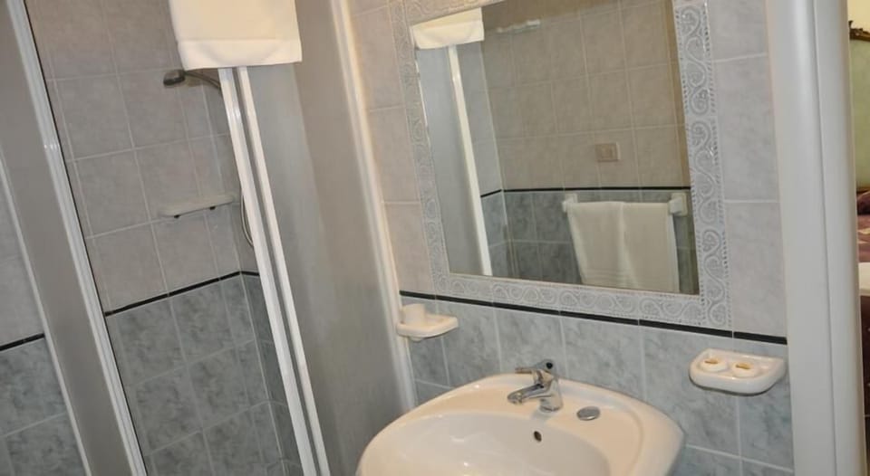 Designer toiletries, hair dryer, bidet, towels