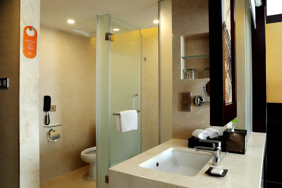 Combined shower/tub, free toiletries, hair dryer, bathrobes