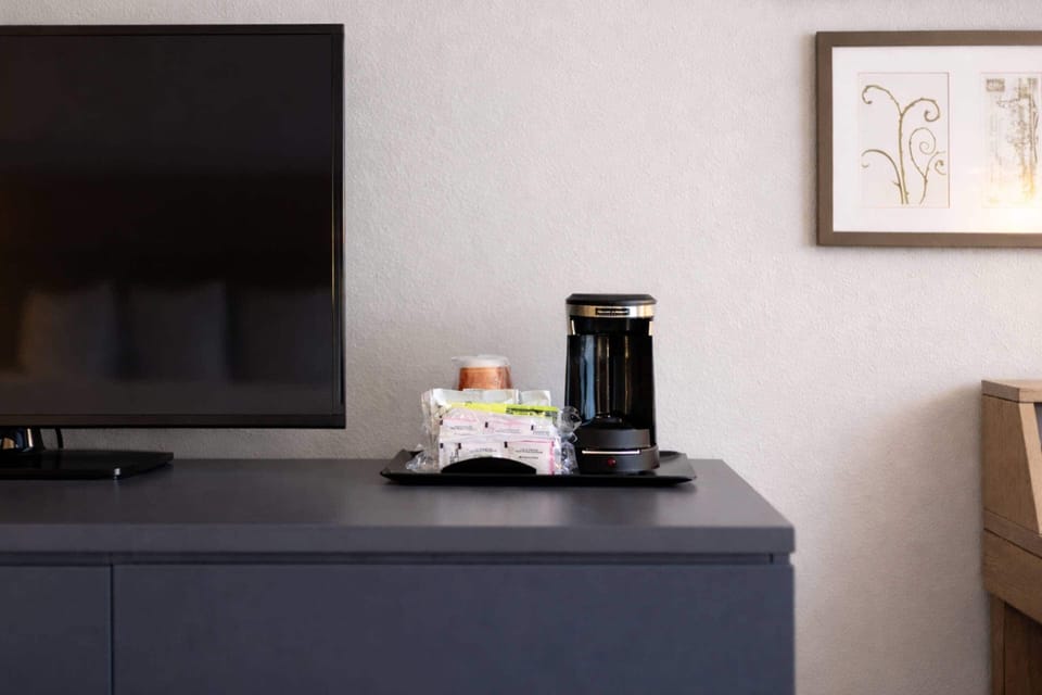 Room, 2 Queen Beds, Non Smoking | In-room safe, desk, laptop workspace, blackout drapes