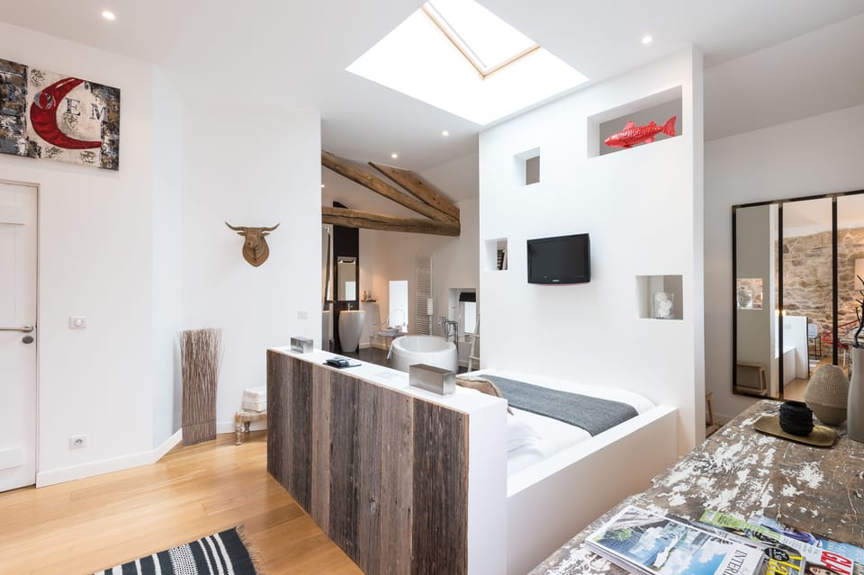 Executive Suite | 1 bedroom, premium bedding, free minibar items, blackout drapes