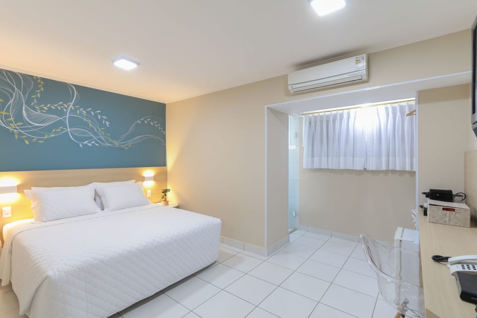 Premium Double Room, 1 Queen Bed | Desk, laptop workspace, blackout drapes, free WiFi