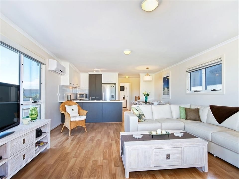 Sunset at Snapper Point | Living area | Flat-screen TV, DVD player