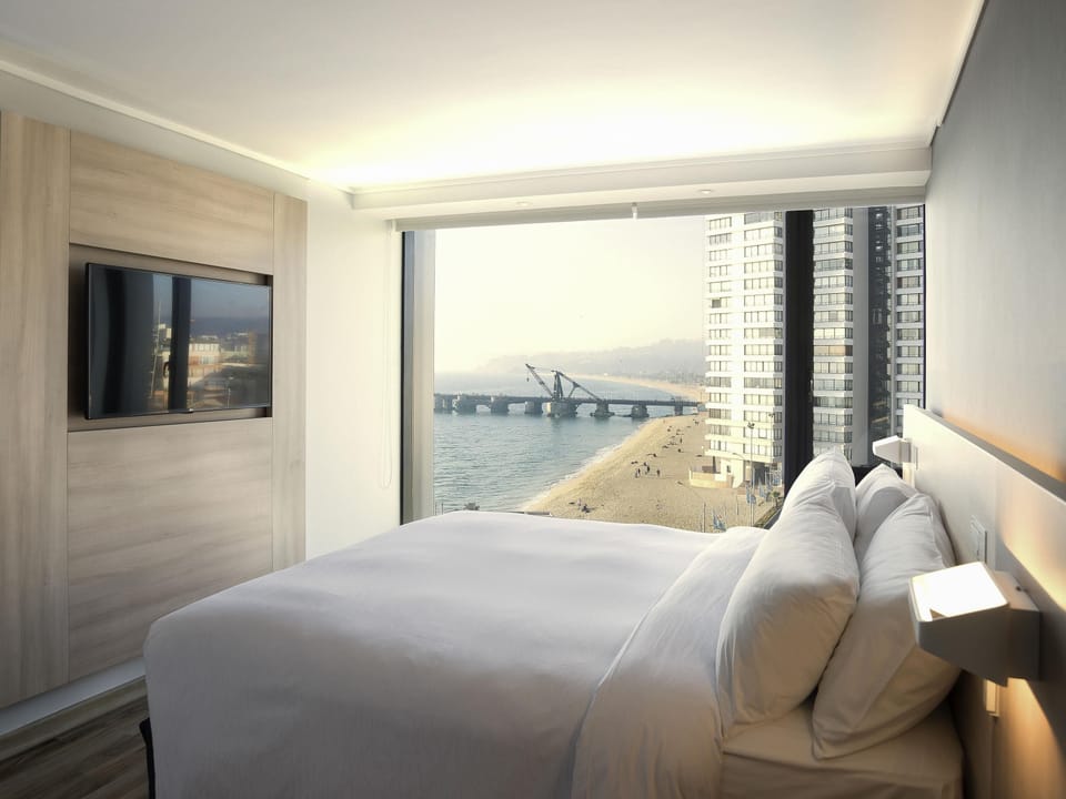 Premium Room, 1 King Bed, Sea View | Minibar, in-room safe, desk, laptop workspace