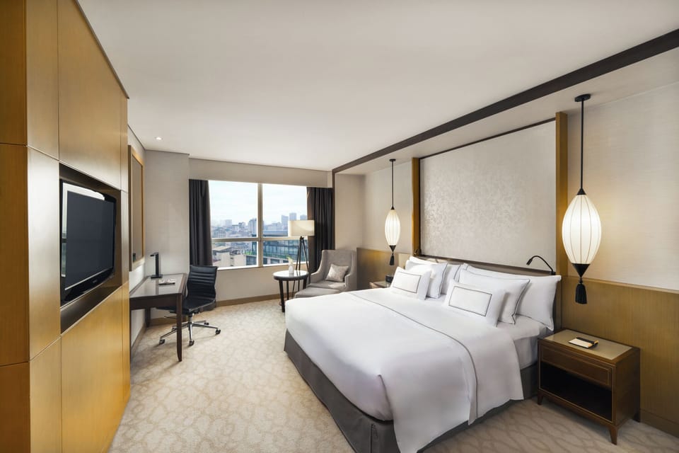 The Level Premium | Minibar, in-room safe, desk, laptop workspace