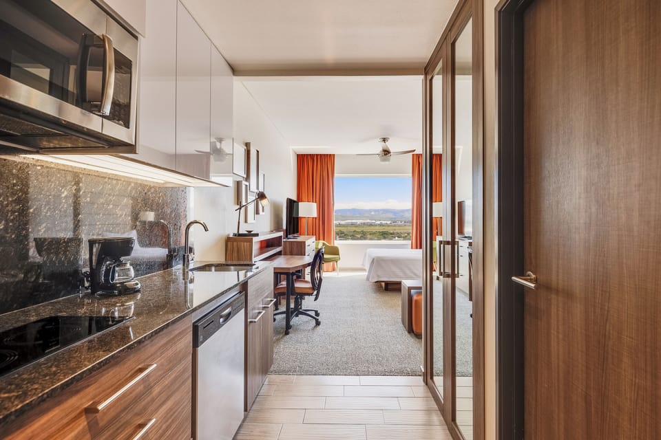 Suite, 1 Queen Bed | In-room safe, desk, blackout drapes, soundproofing