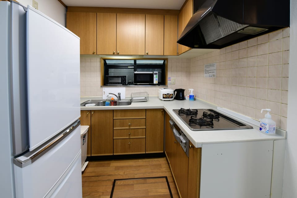 Family House | Private kitchen | Full-size fridge, microwave, stovetop, electric kettle