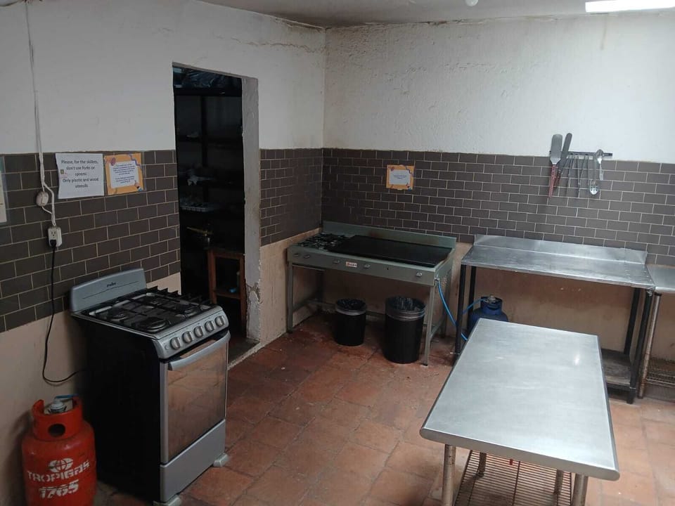 Full-size fridge, microwave, cookware/dishes/utensils, lobster pot