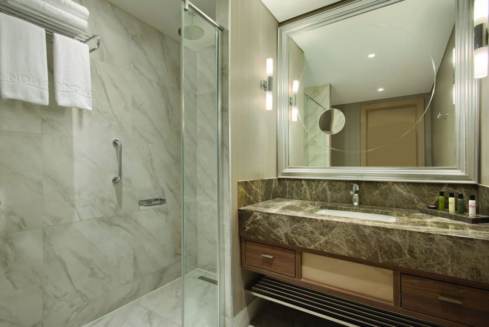 Shower, free toiletries, hair dryer, slippers