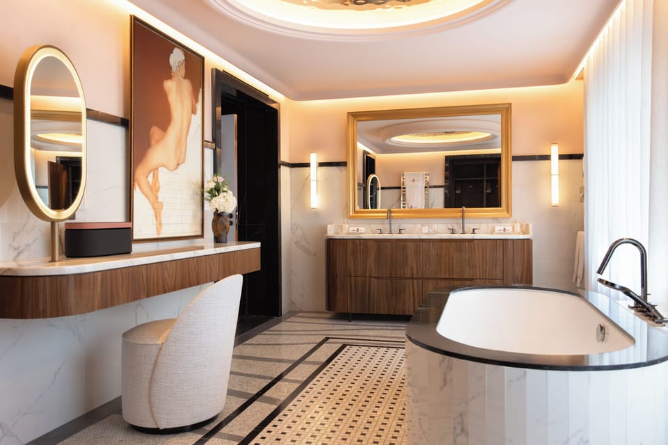 Designer toiletries, hair dryer, bathrobes, slippers