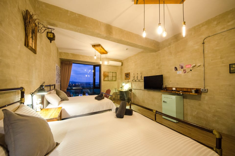 Family Quadruple Room, 2 Double Beds, Terrace | Individually furnished, desk, blackout drapes, soundproofing