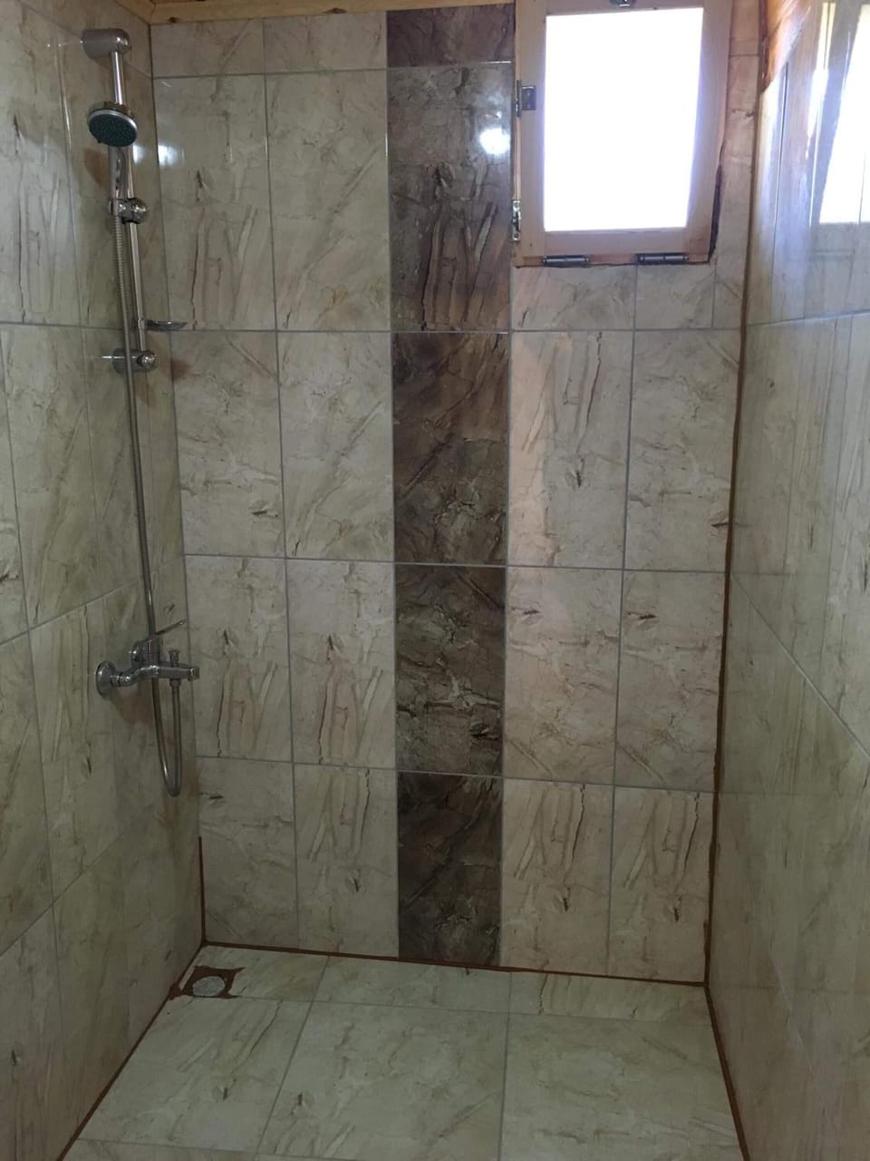Shower, free toiletries, hair dryer, slippers