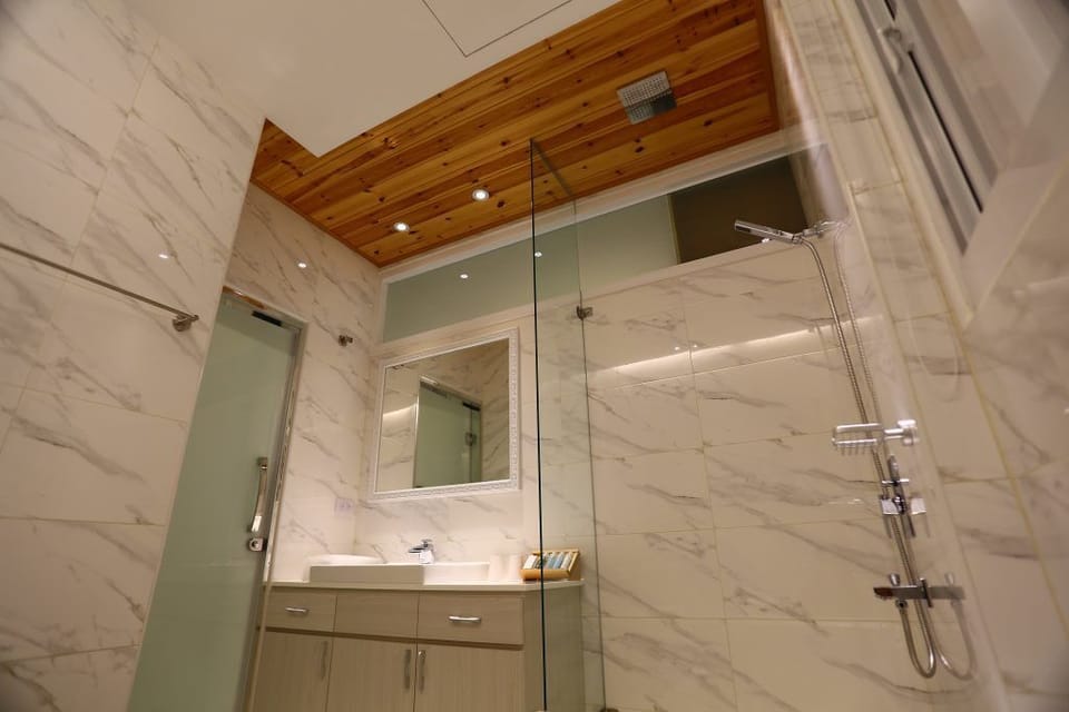 Shower, free toiletries, hair dryer, slippers