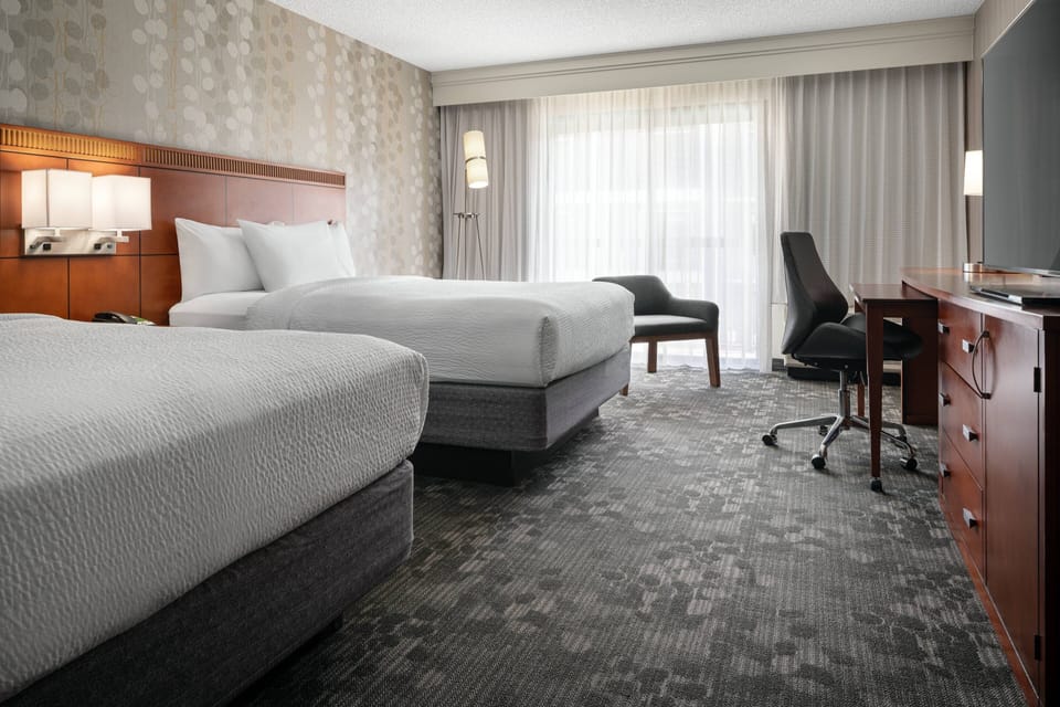 Room, 2 Queen Beds | Hypo-allergenic bedding, desk, laptop workspace, blackout drapes