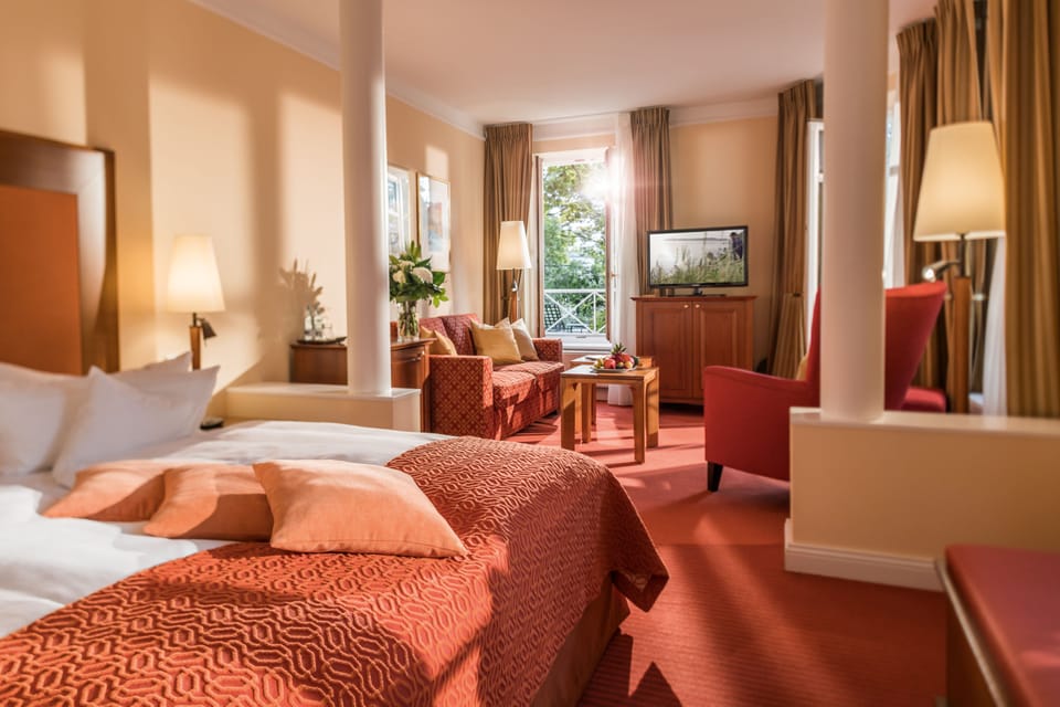 Deluxe-Doppelzimmer mit Balkon | Hypo-allergenic bedding, minibar, in-room safe, individually decorated