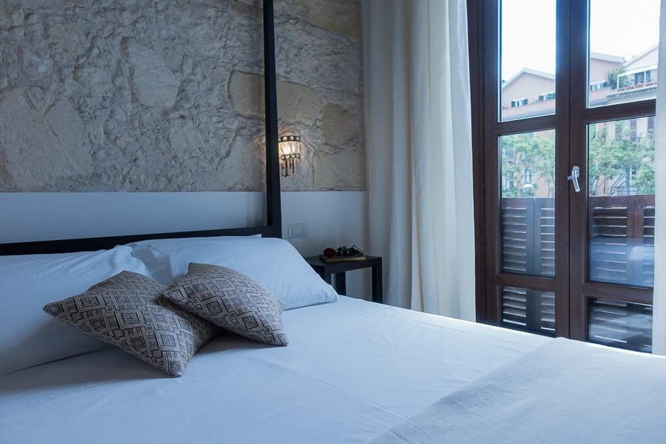 Deluxe Double Room, 1 Queen Bed, Balcony, City View | Minibar, desk, soundproofing, iron/ironing board