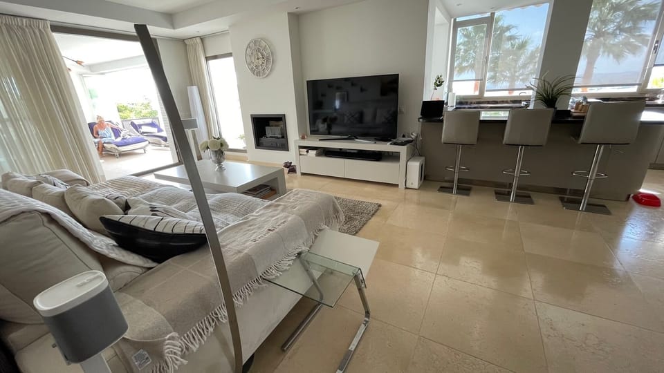 Deluxe Apartment, 2 Bedrooms, Hot Tub, Sea View | Living area | Flat-screen TV, iPod dock, MP3 dock