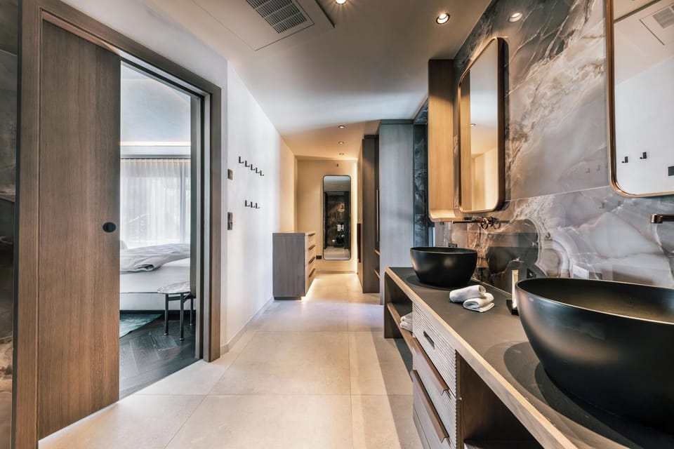 Luxury Villa, 2 Bedrooms, Overwater | Bathroom | Shower, rainfall showerhead, hair dryer, bathrobes