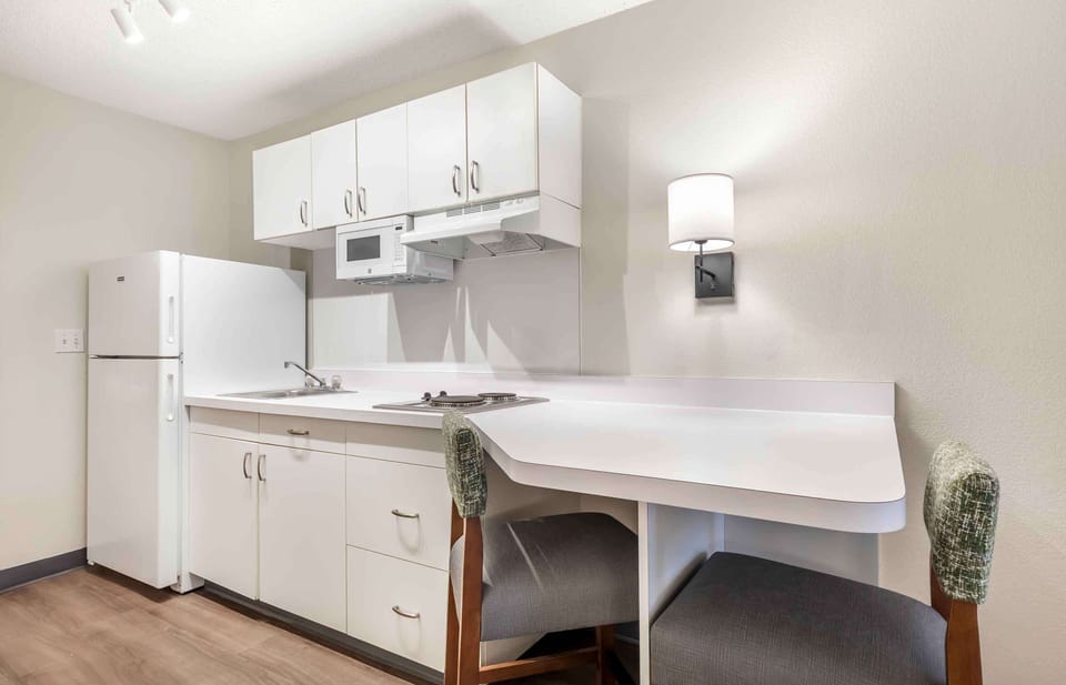 Studio, 2 Queen Beds, Non Smoking | Private kitchen | Full-size fridge, microwave, stovetop, coffee/tea maker