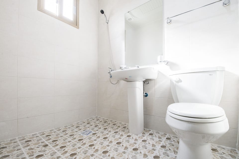 Shower, free toiletries, hair dryer, slippers