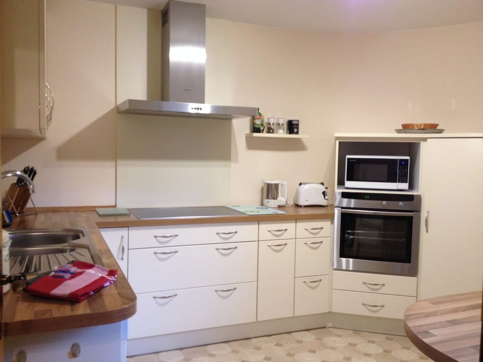 Family Condo, 2 Bedrooms | Private kitchen | Fridge, microwave, oven, stovetop