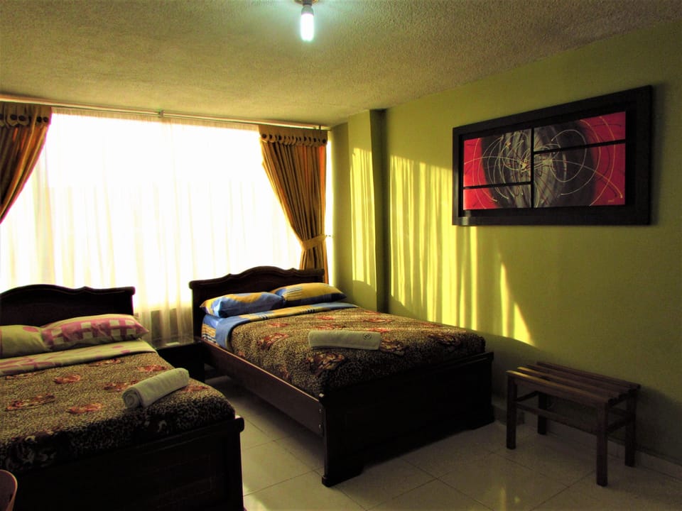Quadruple Room | Desk, iron/ironing board (on request), WiFi (free), bed sheets