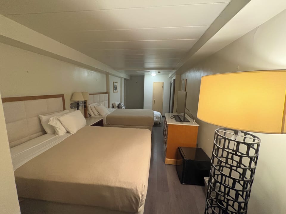  Two Double Beds with Sofa | In-room safe, desk, laptop workspace, blackout drapes