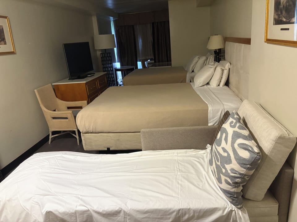  Two Double Beds with Sofa | In-room safe, desk, laptop workspace, blackout drapes