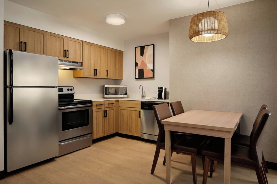 Suite, 2 Bedrooms | Private kitchen | Full-size fridge, microwave, oven, stovetop