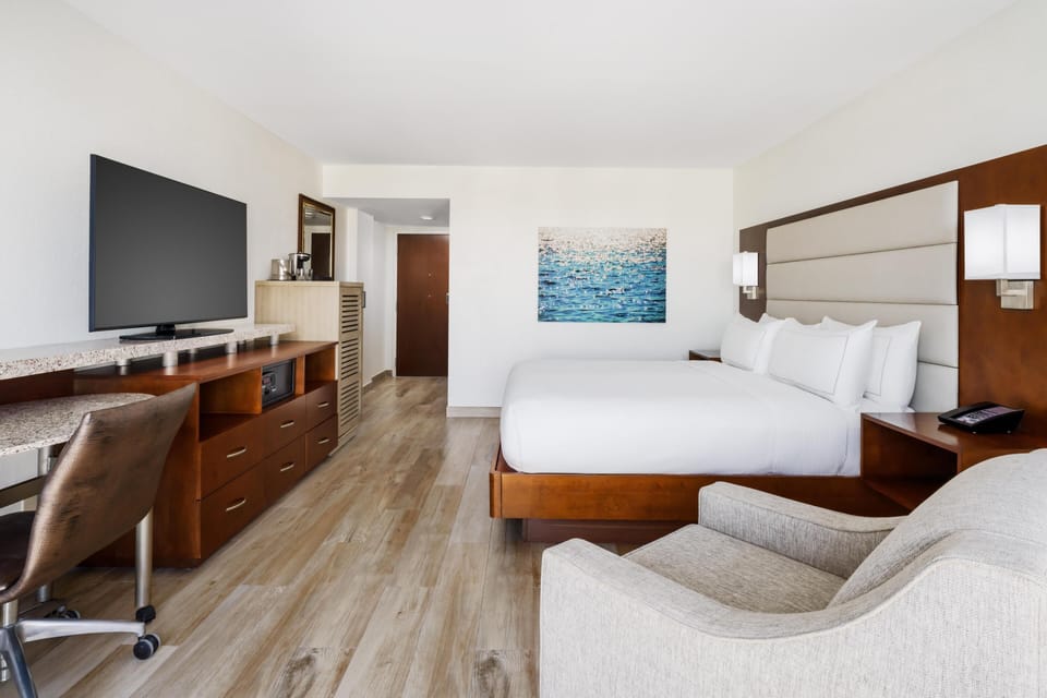 Premium bedding, down comforters, pillowtop beds, in-room safe