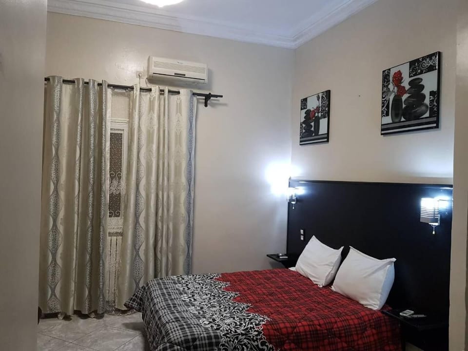 Desk, blackout drapes, rollaway beds (surcharge), WiFi (free)