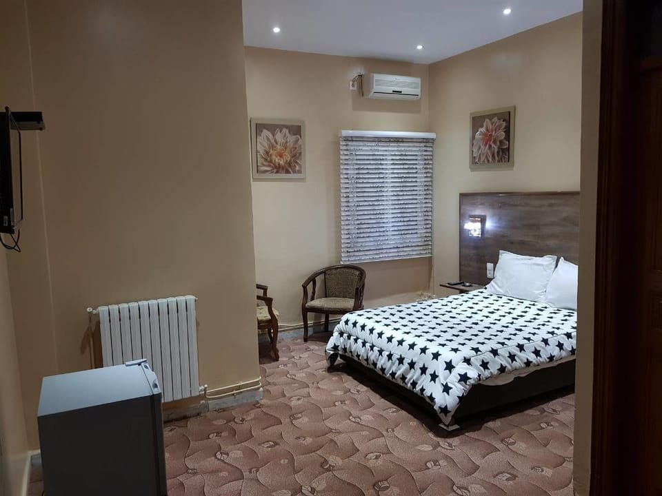 Standard Triple Room | Desk, blackout drapes, rollaway beds (surcharge), WiFi (free)