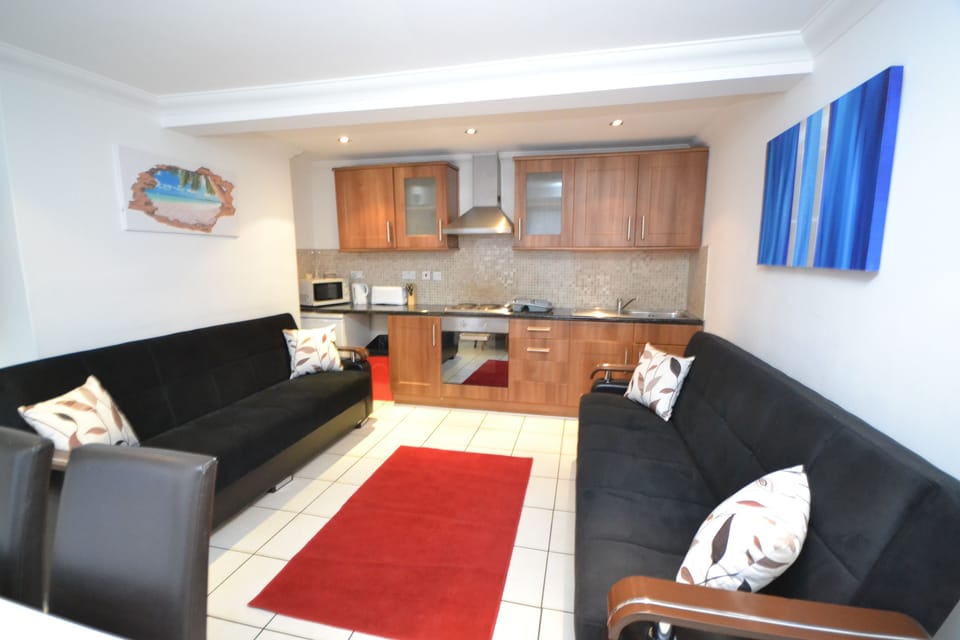 Apartment, 2 Bedrooms | Living area | Flat-screen TV