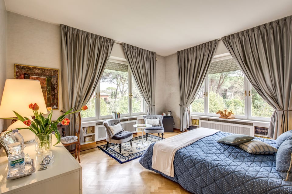 Deluxe Quadruple Room, Private Bathroom | Frette Italian sheets, premium bedding, down comforters, pillowtop beds