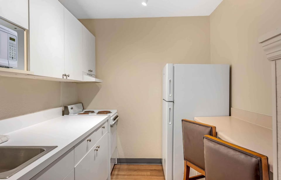 Deluxe Studio, Multiple Beds, Non Smoking | Private kitchen | Full-size fridge, microwave, stovetop, coffee/tea maker