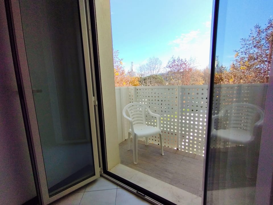 Economy Triple Room, Balcony | Terrace/patio