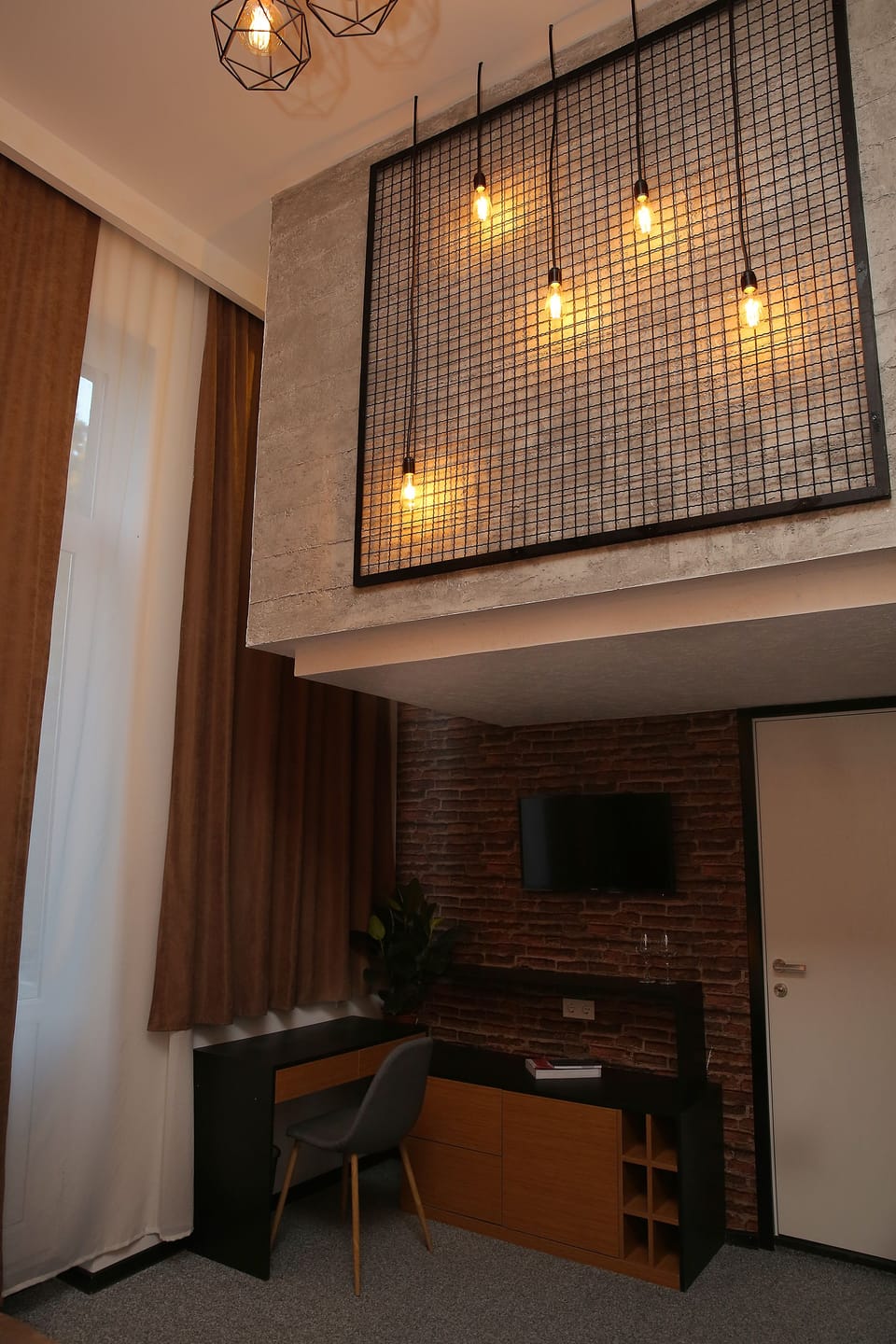Superior Double or Twin Room | Minibar, in-room safe, desk, iron/ironing board