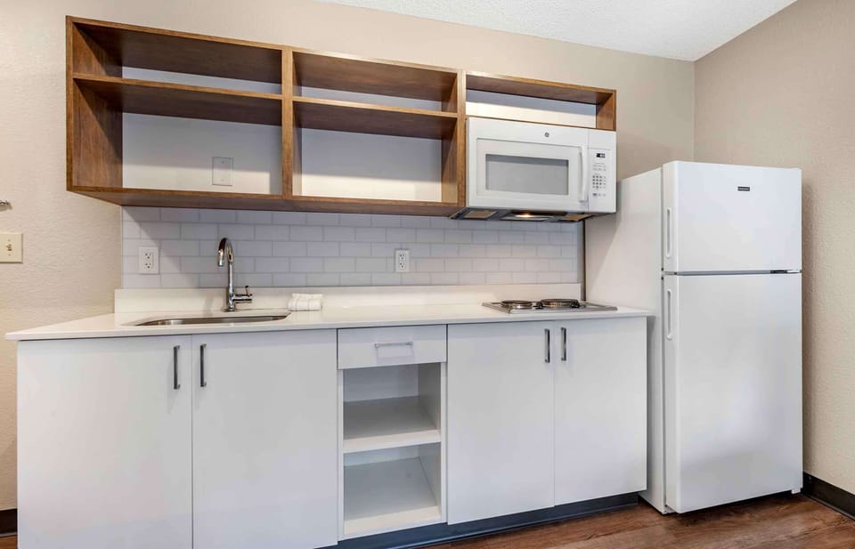 Suite, 1 King Bed, Non Smoking (1 Bedroom) | Private kitchen | Full-size fridge, microwave, stovetop, coffee/tea maker