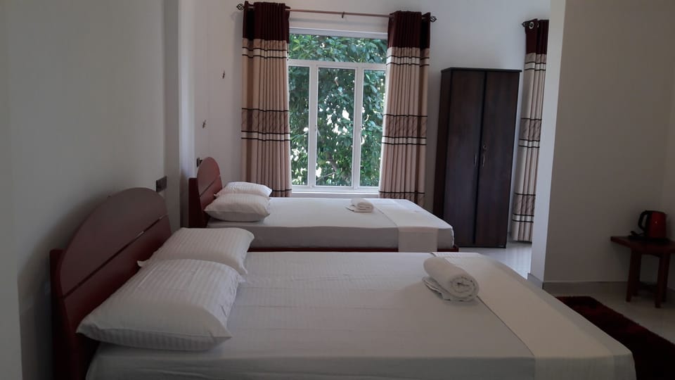 Family Room, 2 Queen Beds | 1 bedroom, Egyptian cotton sheets, pillowtop beds, in-room safe