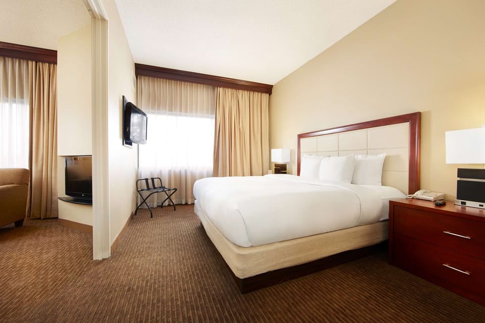 Premium bedding, down comforters, pillowtop beds, in-room safe