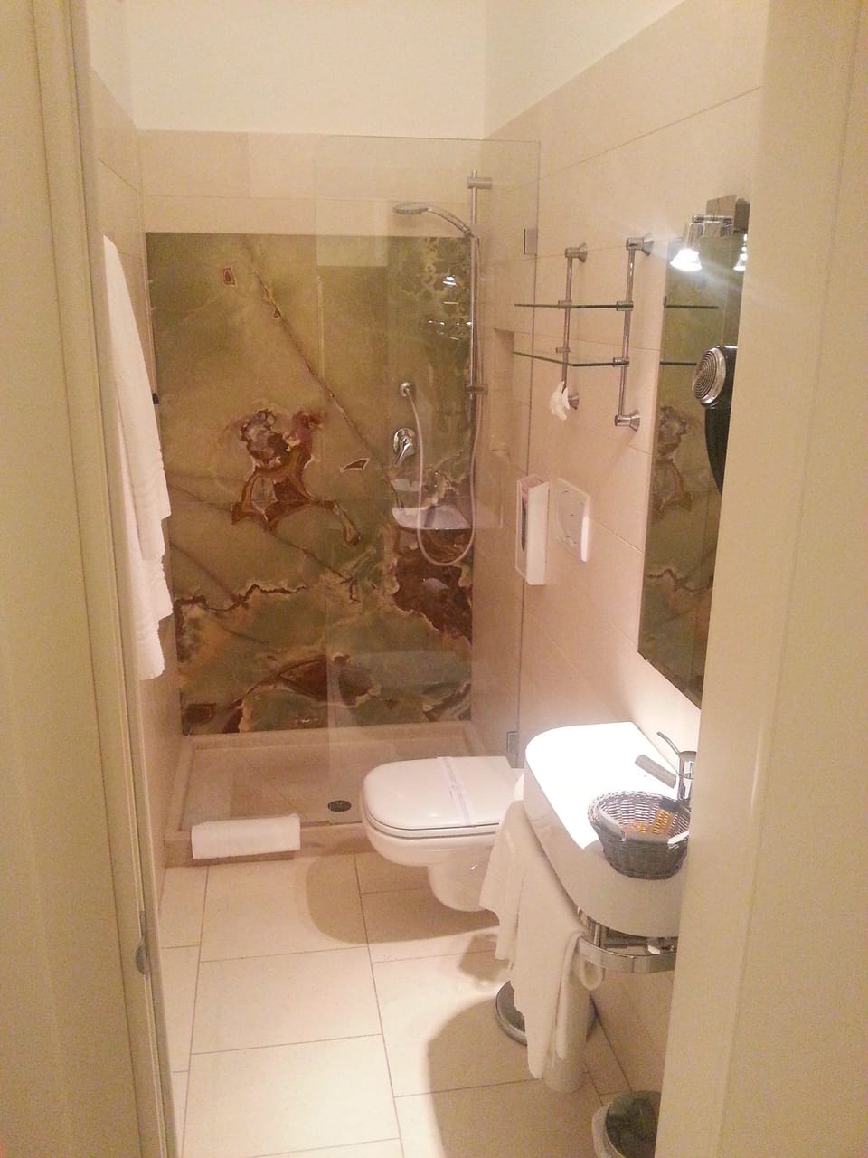 Shower, free toiletries, hair dryer, towels