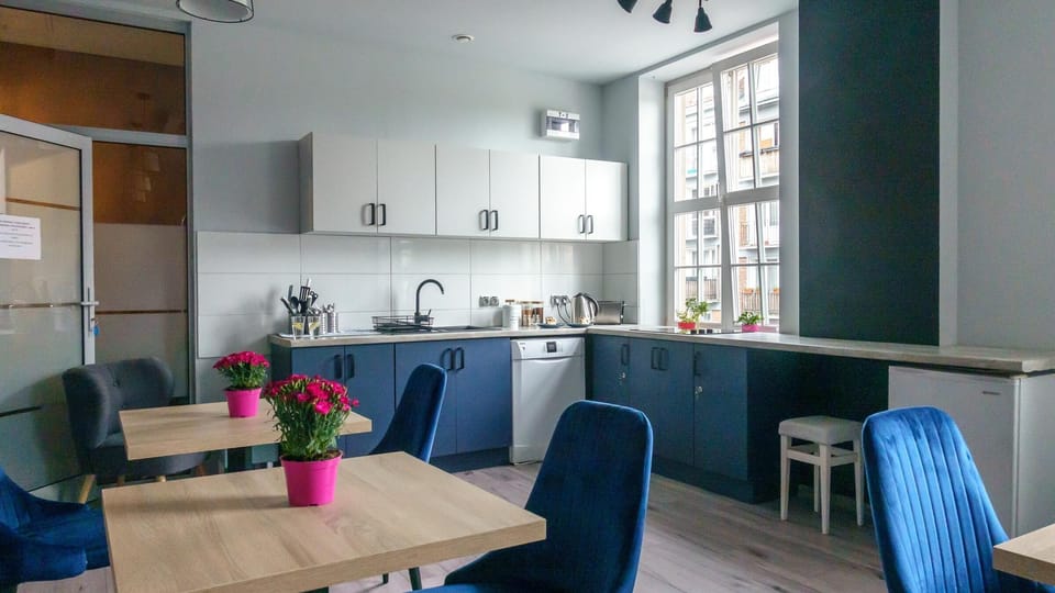 Fridge, stovetop, electric kettle, cookware/dishes/utensils